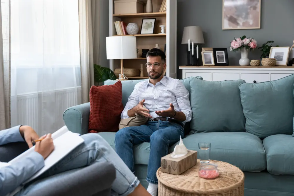 01 How Long Does Cocaine Stay in Your System a-man-speaking-to-therapist