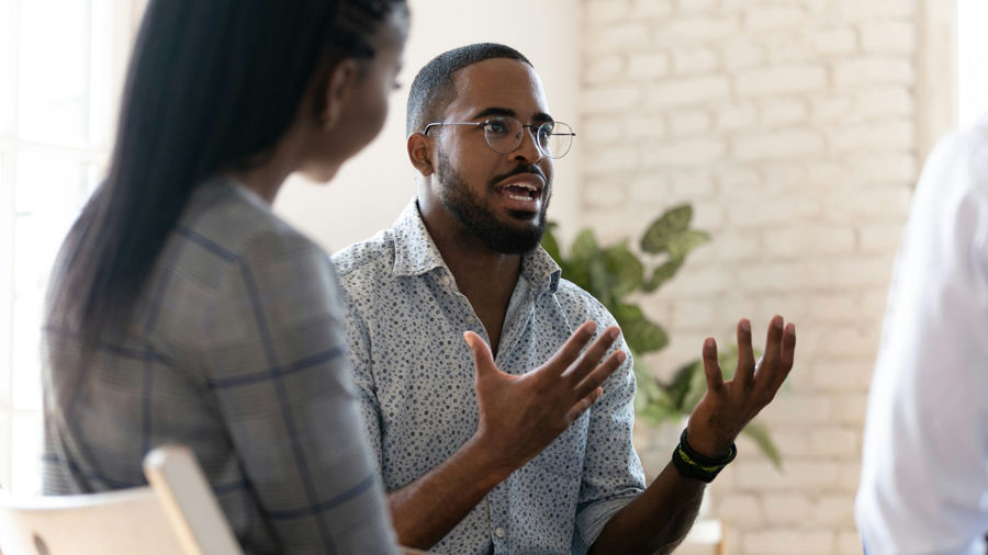 Man sharing his experiences during his group therapy in New Jersey.