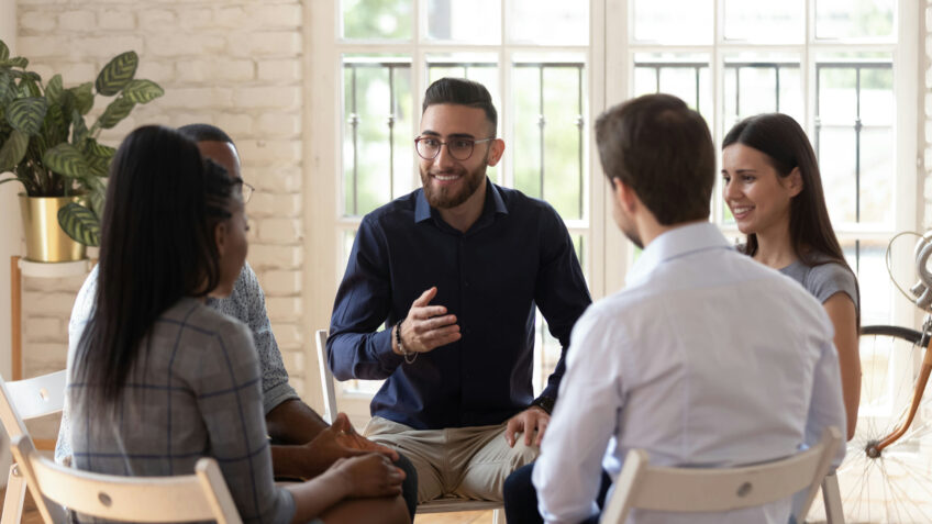 Set of individuals in group therapy.