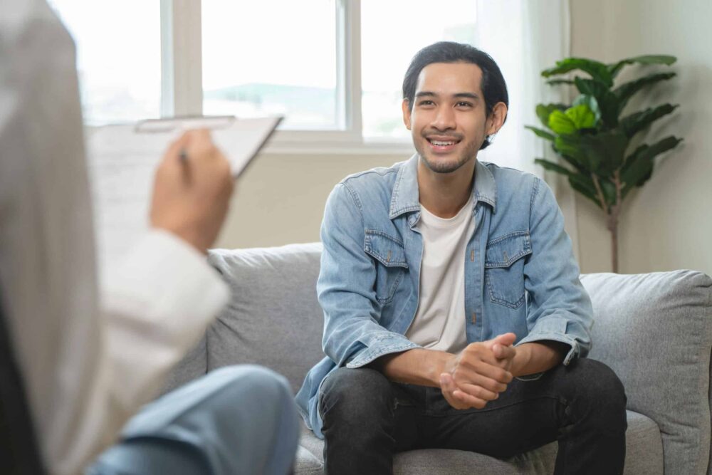Man receiving CBT for addiction treatment with his therapist in New Jersey Man receiving CBT for addiction treatment with his therapist in New Jersey